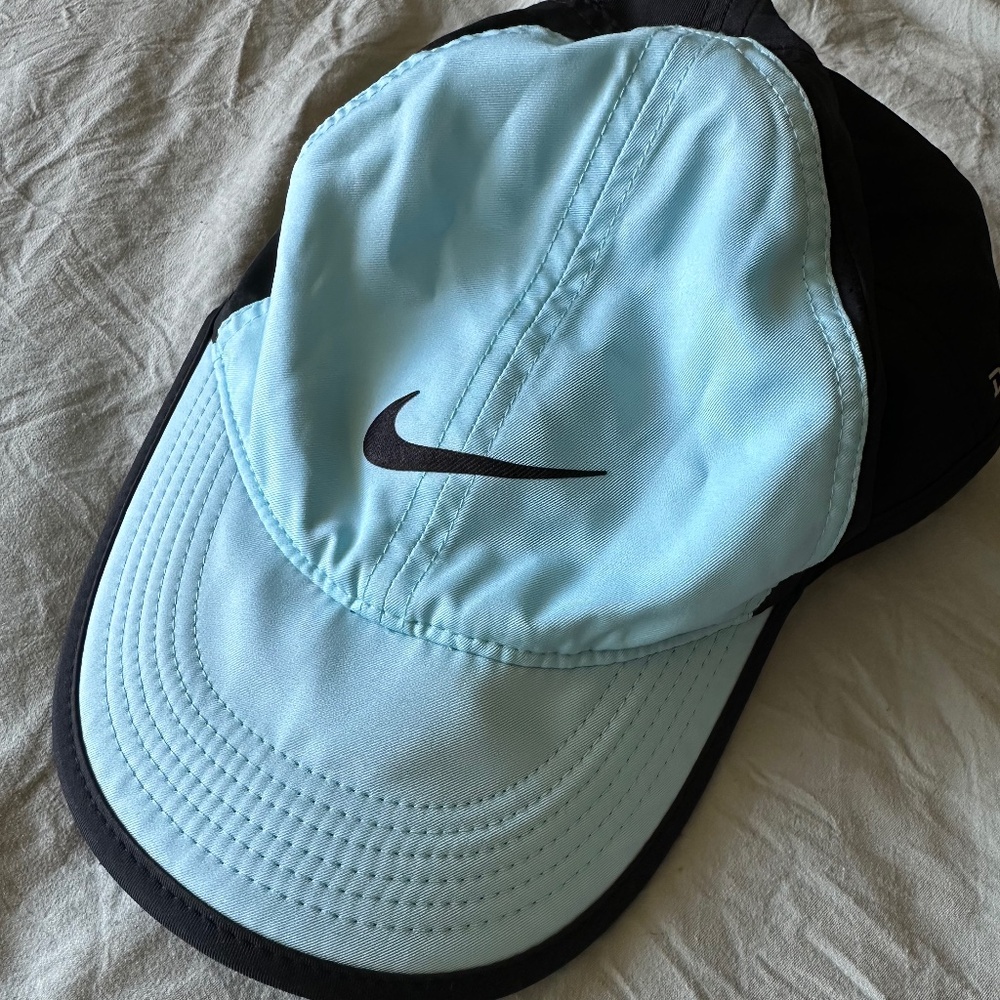 Nike Featherlight Dri-Fit Active Light Blue and Black One Size Adjustable Womans